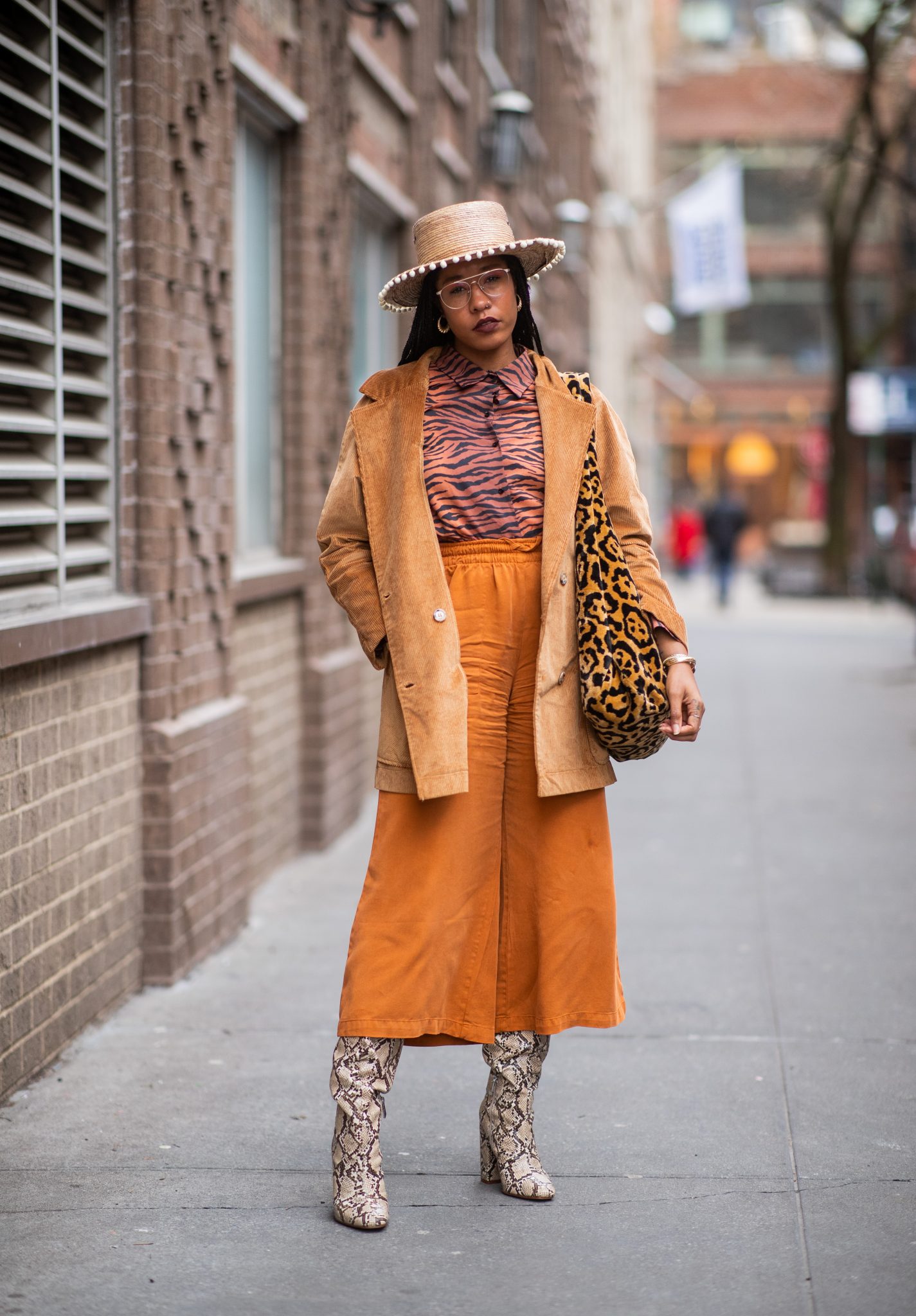 Street style stars at fashion month have made snake the key animal print.