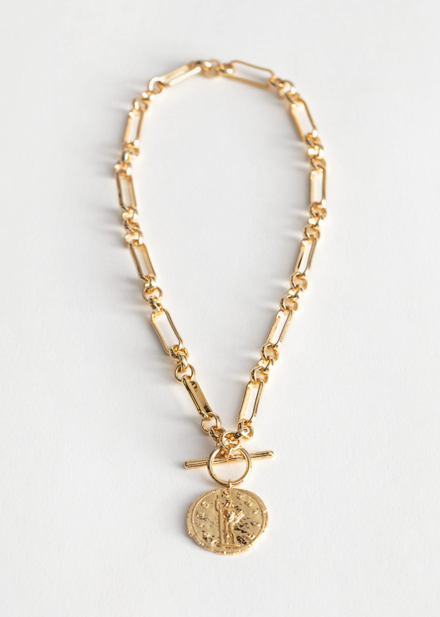 The best gold coin necklaces to shop now