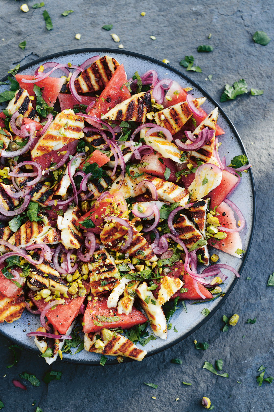 https://images-stylist.s3-eu-west-1.amazonaws.com/app/uploads/2021/07/15174837/watermelon-halloumi-lime-pickled-red-onions-1-1120x1680.png